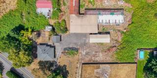 Rare 7-acre property - renovated 3 bed, 2 bath home, with powered barn! Gallery 1