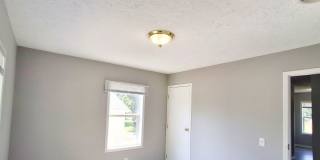 4 Bed / 2 Full Bath House with Brand-New Kitchen, Attached Garage, and Full Basement - Built 2001 Gallery 14