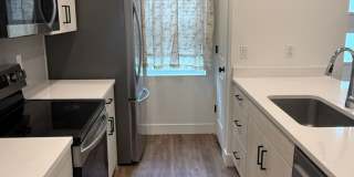 Beautiful townhome with 2 car garage, central air, pickleball court and laundry hookups. Gallery 1