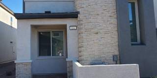 Contemporary townhome with modern exterior and attached garage. Gallery 1