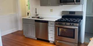 No Broker Fee | Renovated 4 Bed, 2 Bath Townhome with In-Unit Laundry Gallery 1