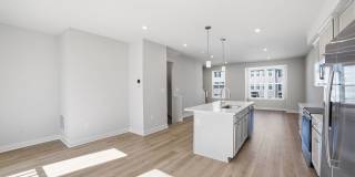 This home presents a harmonious blend of elegance, flexibility, and modern convenience within a welcoming community setting. Gallery 9