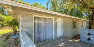 RENOVATED 2/1 w/ New Flooring/Paint, Fenced Yard, Deck, Walk In Closets, Granite Counters, & Stainless Appliances ! Avail NOW for $1375/month Gallery 1
