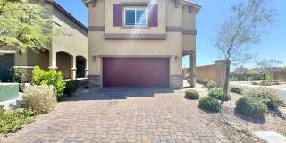 Wonderful 4-bedroom, 3-bathroom home tucked inside a desirable gated community in northwest Las Vegas. Gallery 1