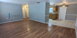 Must See 3/2/1 over 1000sf with tile/laminate floors, fresh paint, fenced yard and large living room!! Must See 3/2/1 over 1000sf with tile/laminate floors, fresh paint, fenced yard and large living room!! Gallery 5