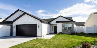 SUGAR CITY TWIN HOME 3 BED 2 FULL BATH - FENCED YARD WITH EX-LARGE 2 STALL GARAGE Gallery 1