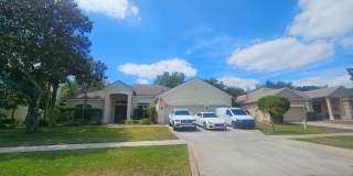 Elegant Home in Gated Regency Hills Community with Three Car Garage Gallery 1