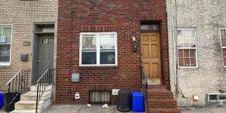 2 Bedroom, 1 Bath South Philadelphia RowHome! W/D! Yard! Wood-burning Fireplace! Gallery 1