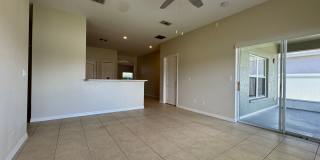 Beautiful 3/2 home near Lake Nona ~ Fenced In Yard ~ LVP & Tile Flooring ~ Community Pool! Gallery 13
