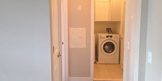 Beautiful 2nd floor (with elevator services) condominium: 2-bed, 2-bath, beautiful kitchen, bonus room, laundry room & deck! Gallery 23