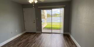 1/1 in the Heart of Brandon with a lake view! Gallery 11