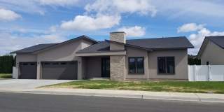 Occupied, do not disturb tenants. West Valley 3 bedroom 3 Car Garage Custom Built Gallery 1
