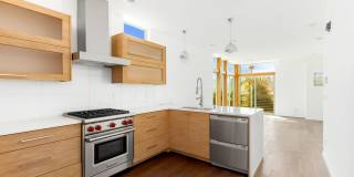 Eastlake Townhome with Rooftop Deck, Views & Dedicated Parking, 2 Bed + Office, 2 Bath Gallery 8