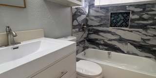 Newly remodeled 3 bed 1 bath garage conversion with monitored security! Gallery 5