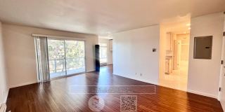 Beautiful large 1 bedroom with Hardwood laminate floors, parking and water view! Gallery 1