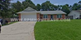 Charming 3-Bedroom Home with Brand New Windows, Garden Yard and Coffee Bar in Navarre Gallery 1