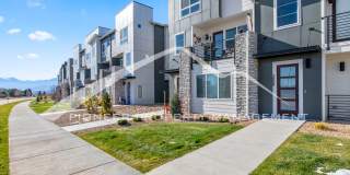 Contemporary Townhome in the Vibrant Interquest Low Maintenance Community with 2 car garage, Washer/Dryer, and AC Gallery 1