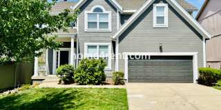 Spacious, 2 Story Home in Blue Valley Schools w/ Updated Kitchen, Fenced Yard, and a Finished Basement! Gallery 1