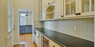Stunning two-story spacious home on tranquil tree-lined street. Gallery 21