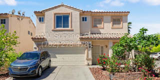 NW!! 4 Bedrooms!!! All Tile and Pergo flooring T/O!! NO Carpet!!! Low Maintenance Desert landscaping front and back!! With Patio cover in back!!! Gallery 1