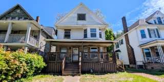 Discover this four-bedroom, two-bath home in Cleveland Gallery 1