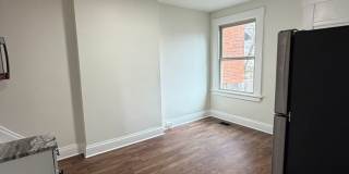 Rare 2-Full Bath Find: Pristine Renovation with Designer En-Suite & Granite Gallery 6