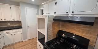 Newly remodeled 3 bed 1 bath garage conversion with monitored security! Gallery 4