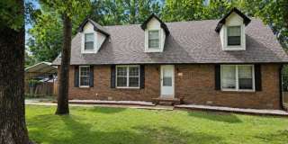 Welcome home to the perfect blend of peaceful country charm and modern city living! Gallery 1