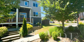 Modern End-Unit Townhome with Private Fenced Yard, Gourmet Kitchen & Spacious Layout Gallery 1