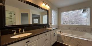 Grand 5 Bedroom Home Featuring 19ft Ceilings, Family Room & Main-Level Suite Gallery 45