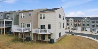 Welcome to this like new fully furnished home located in The Village at Courthouse Commons in Spotsylvania. Gallery 27