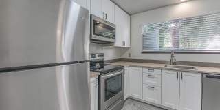 NW Vancouver Condo with Detached Garage & Dedicated Parking Gallery 6
