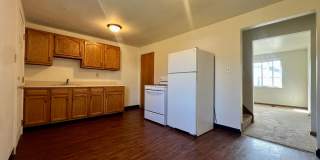 Cozy Two Bedroom Townhome with Central AC  Off-Street Parking! Call Today to Schedule a Tour! Gallery 1