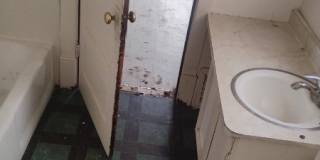 1401 West Adrian G. Hinton Avenue Gallery 7