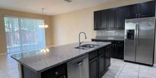 Lawn Care Included! Beautiful 3 Bedroom, 2.5 Bathroom End Unit Townhome Located in the Desirable Belmont Reserve Community! Gallery 9