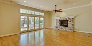 Stunning two-story spacious home on tranquil tree-lined street. Gallery 19