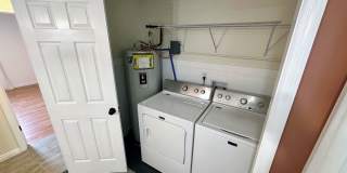 AVAILABLE NOW! Spacious 4 BR, 2 Bath House! Wood Floors, Attached Garage, W/D Included Gallery 21