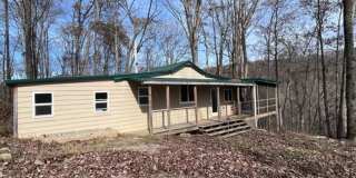 **COMING SOON** Rustic Country Home on 35 Acres in Bethpage, TN Gallery 1