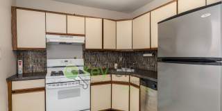 $500 Off First Month! Top-Floor 1BR Condo with NYC Skyline Views, Parking & Walkable Rutherford Location Gallery 7