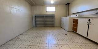 Bi-Level House w/ Massive Backyard, Storage, & Character! Gallery 23