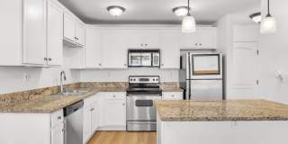 Updated 1-Bedroom Condo with in-Unit Washer/Dryer! Water Included! Gallery 1
