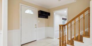 5 BR 4.5 BA home with inground heated pool and extensive hardscape! Gallery 29