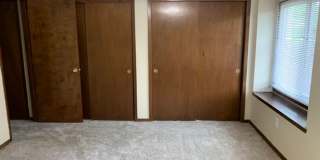 2 BR, 1.5 BA Clive split level duplex.  Deck and one car attached garage. Gallery 12