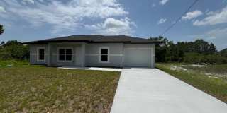 NEW CONSTRUCTION- Modern 3 Bed / 2 Bath Home in Lehigh Acres Gallery 1