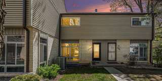 Charming Townhouse with Gas Fireplace & Basement Retreat in Columbine Lakes Community! Gallery 1