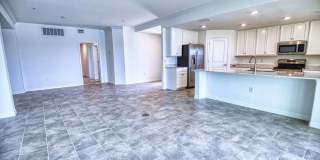 Annual Unfurnished Rental – Coach Home 3 Bedrooms, 2 Baths, 2 Car Garage, with Resort Like Amenities – Gran Paradiso Community! Gallery 1