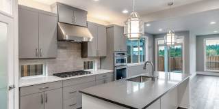 Bethany Stunner - 5 Bedrooms with Main-Level Bed & Bath, Modern Kitchen & Private Fenced Yard Gallery 3