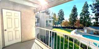 2-Bedroom, 2-Bath Upstairs Condo Unit in Gated Pomona Community, Water/Trash/HOA Included! Gallery 1