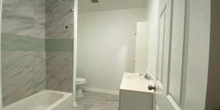 Updated 2-Bedroom Home with Finished Basement and Private Yard Near University City Gallery 6