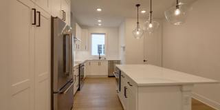 Live Where Style Meets Convenience – 2BR Townhome + Garage Gallery 9